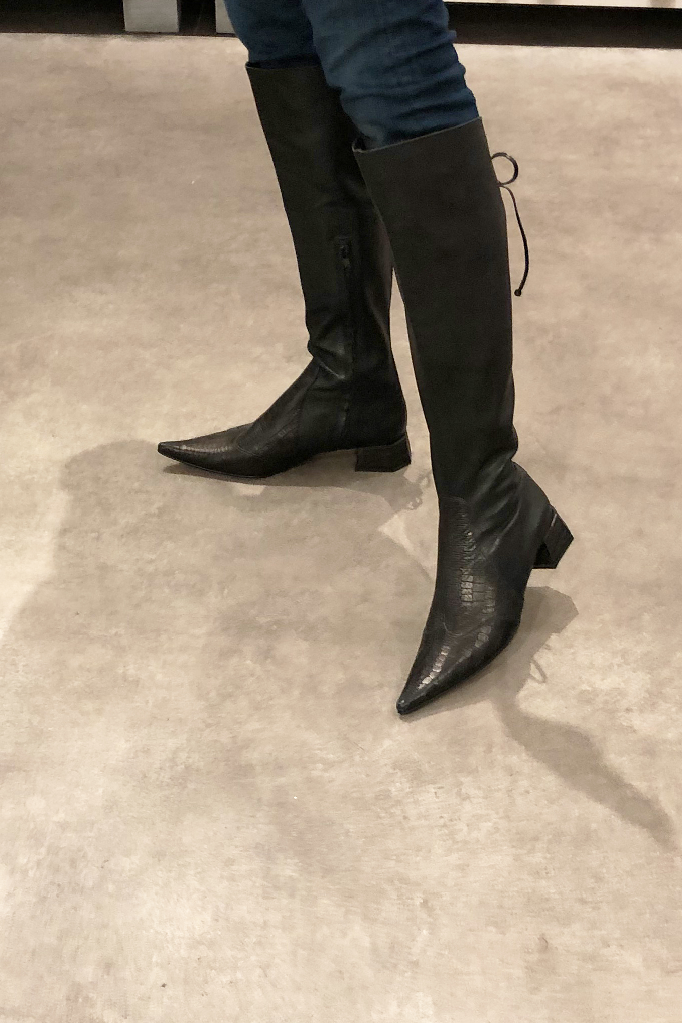 Satin black women's knee-high boots, with laces at the back. Pointed toe. Low flare heels. Made to measure. Worn view - Florence KOOIJMAN